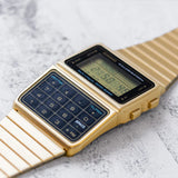 RELOJ CALCULADORA CASIO VINTAGE DBC-611G-1DF DATABANK DORADO